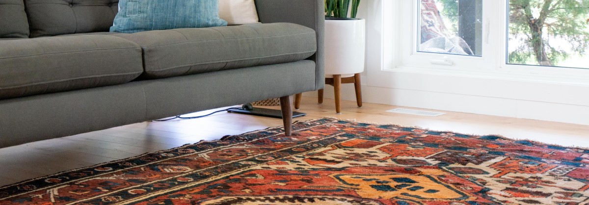 Give your living room more personality by using rugs!